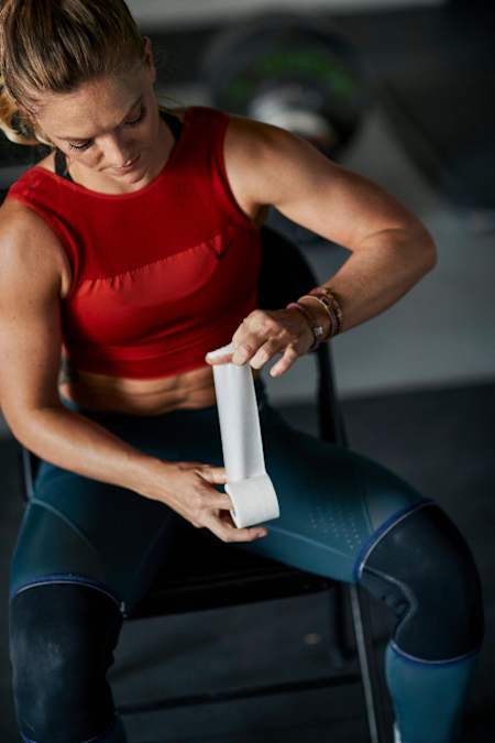 King uses athletic tape on her thumbs to help prevent tearing of the skin.