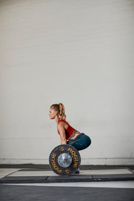 King demonstrates her form for the clean and jerk. “This sport is so rarely perfect,” she says. “But there have been a handful of times that have been pure magic.”