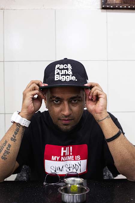 Rapper Gubbi poses for a photo at Shree Krishna Kafe in Koramangala