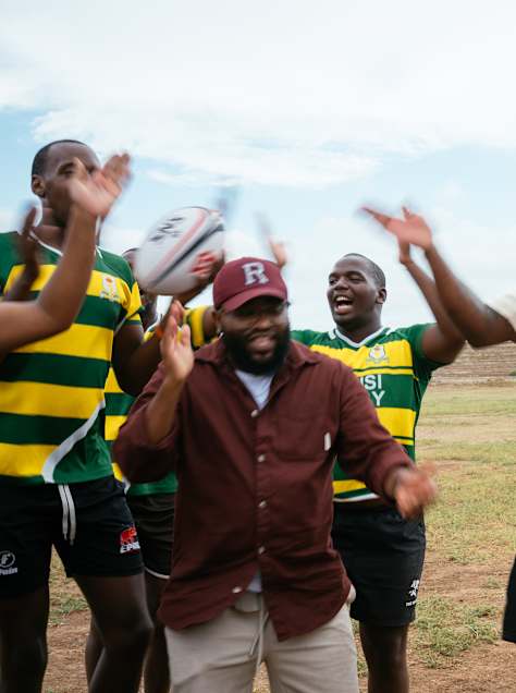 Siya Kolisi joins rugby players during filming for What We Know Season 1, Episode 4, in Zwide, Gqeberha, South Africa, on 4 February 2026