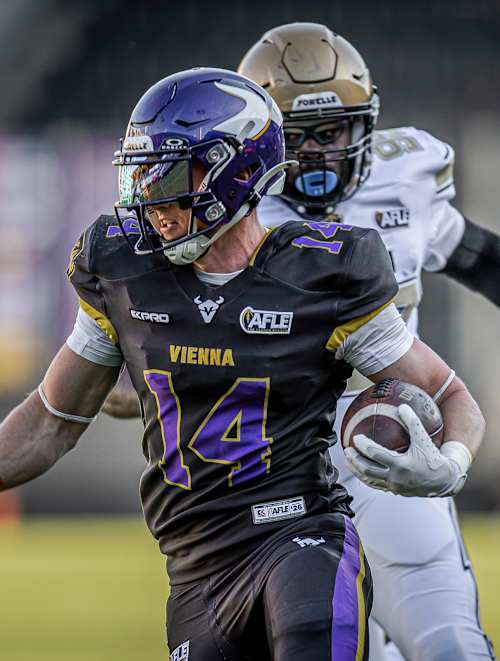Yannick Mayr, a Vienna Vikings player runs with the ball during a game with Berlin Thunder