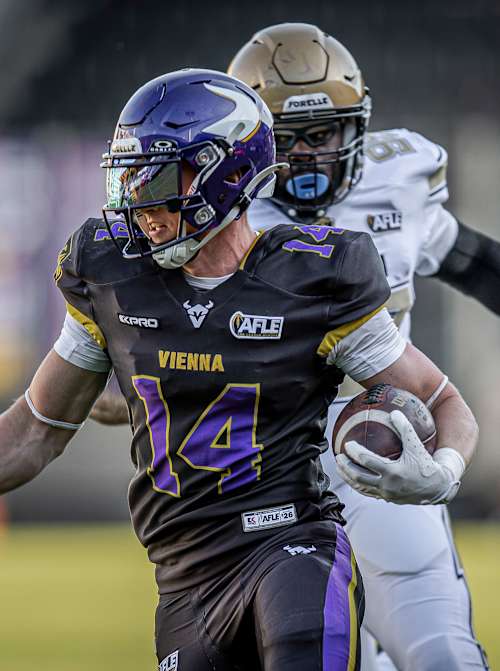 Yannick Mayr, a Vienna Vikings player runs with the ball during a game with Berlin Thunder