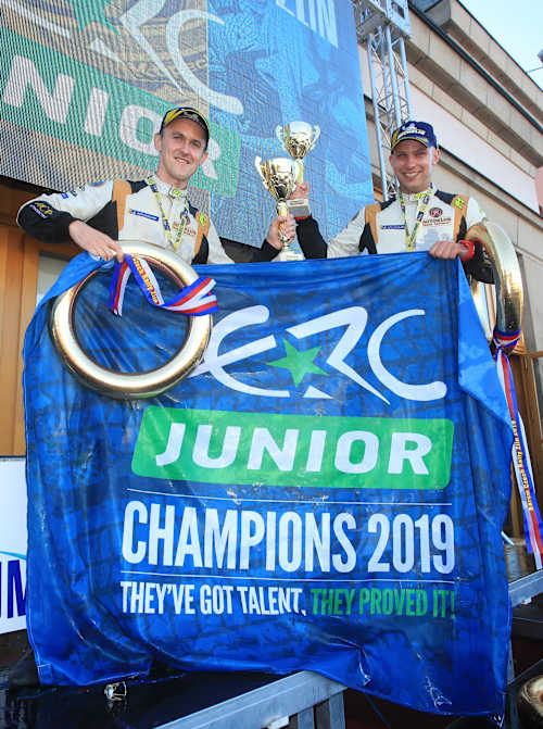 Co-driver Jan Hloušek joins Mareš (left) in celebration in Zlín