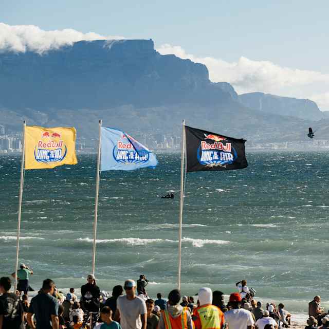In 2024, Red Bull King Of The Air kitesurfing event at Cape Town's scenic beach with Table Mountain backdrop