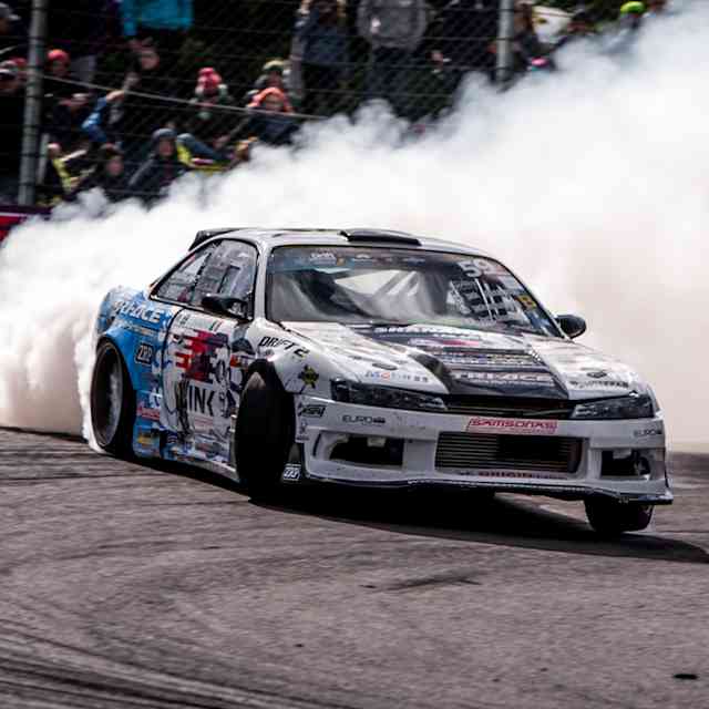An image of a race car in action at the Drift Masters European Championship.
