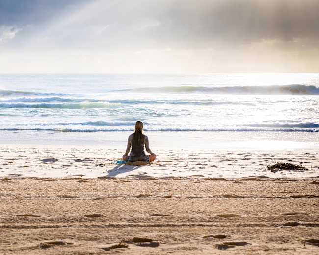 Yoga and surfing can help you live a happier life