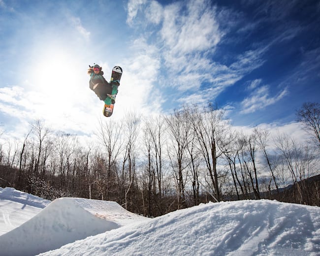 Learn How to Do Snowboard Jumps With Our Trick Tips