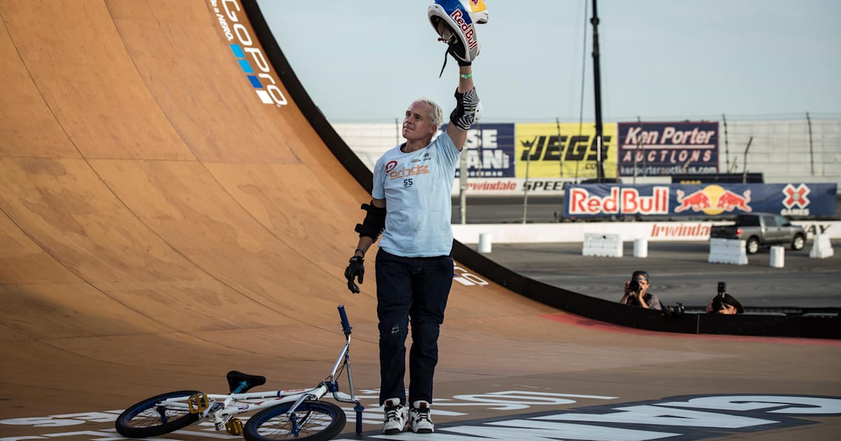 Kevin Robinson Raising His Helmet in the Air on a Vert Ramp