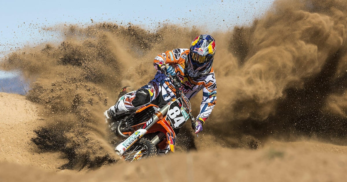 Riding in sand dirt bike shop