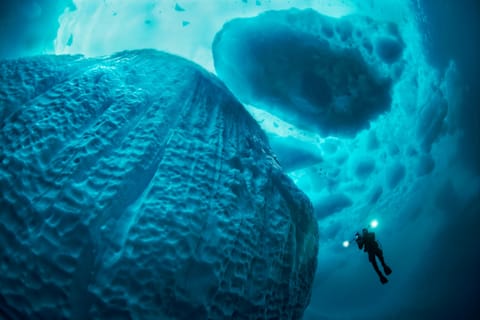 Diving Under Ice 6 Incredible Places Red Bull - roblox scuba diving ice cave