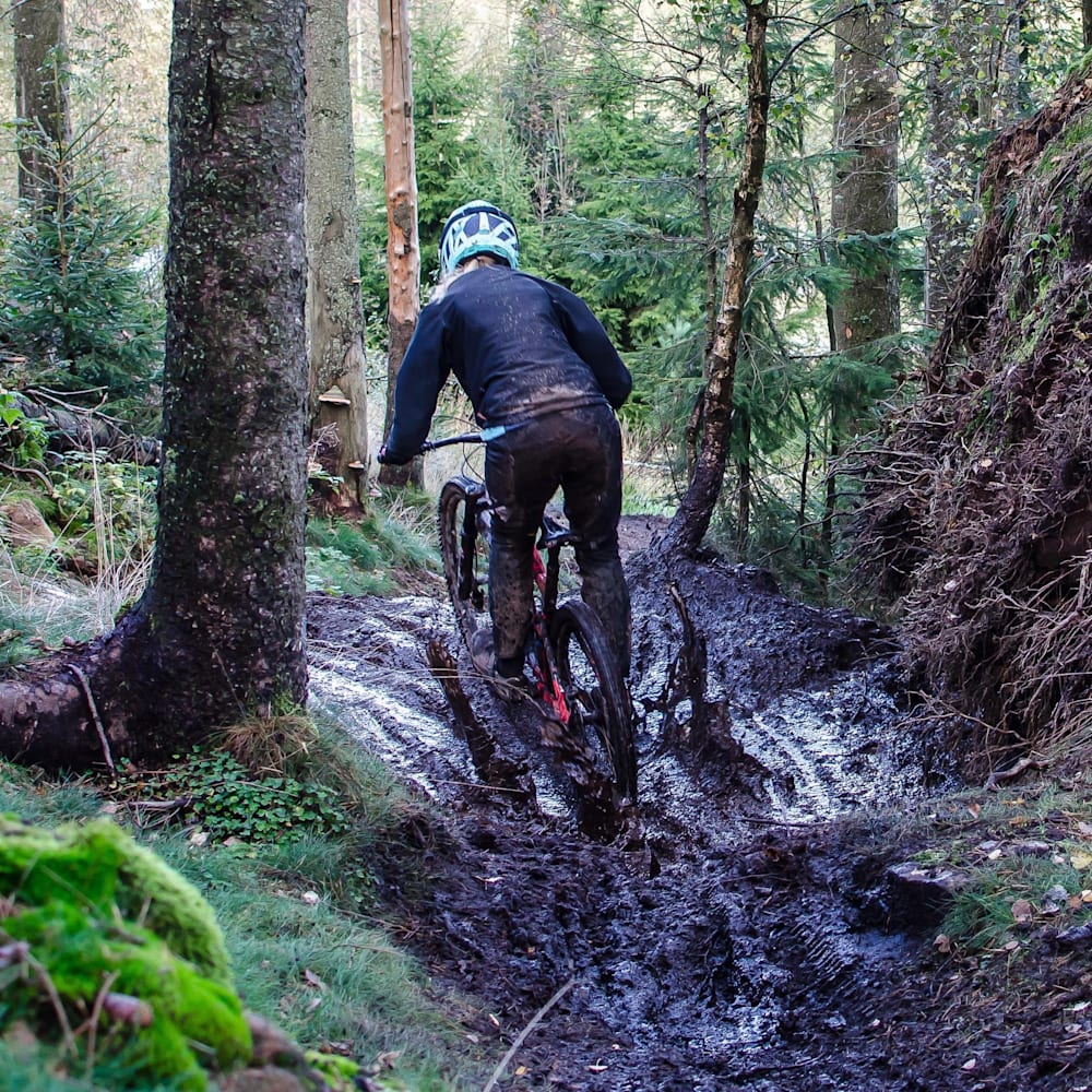 Mountain biking in mud clearance
