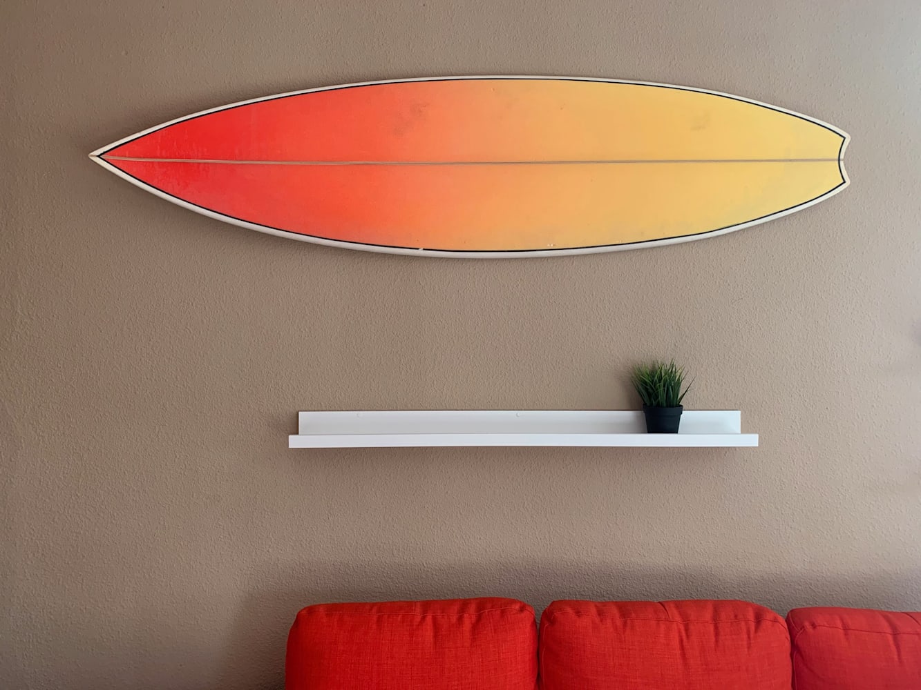 tips para decorar el hogar con una tabla de surf