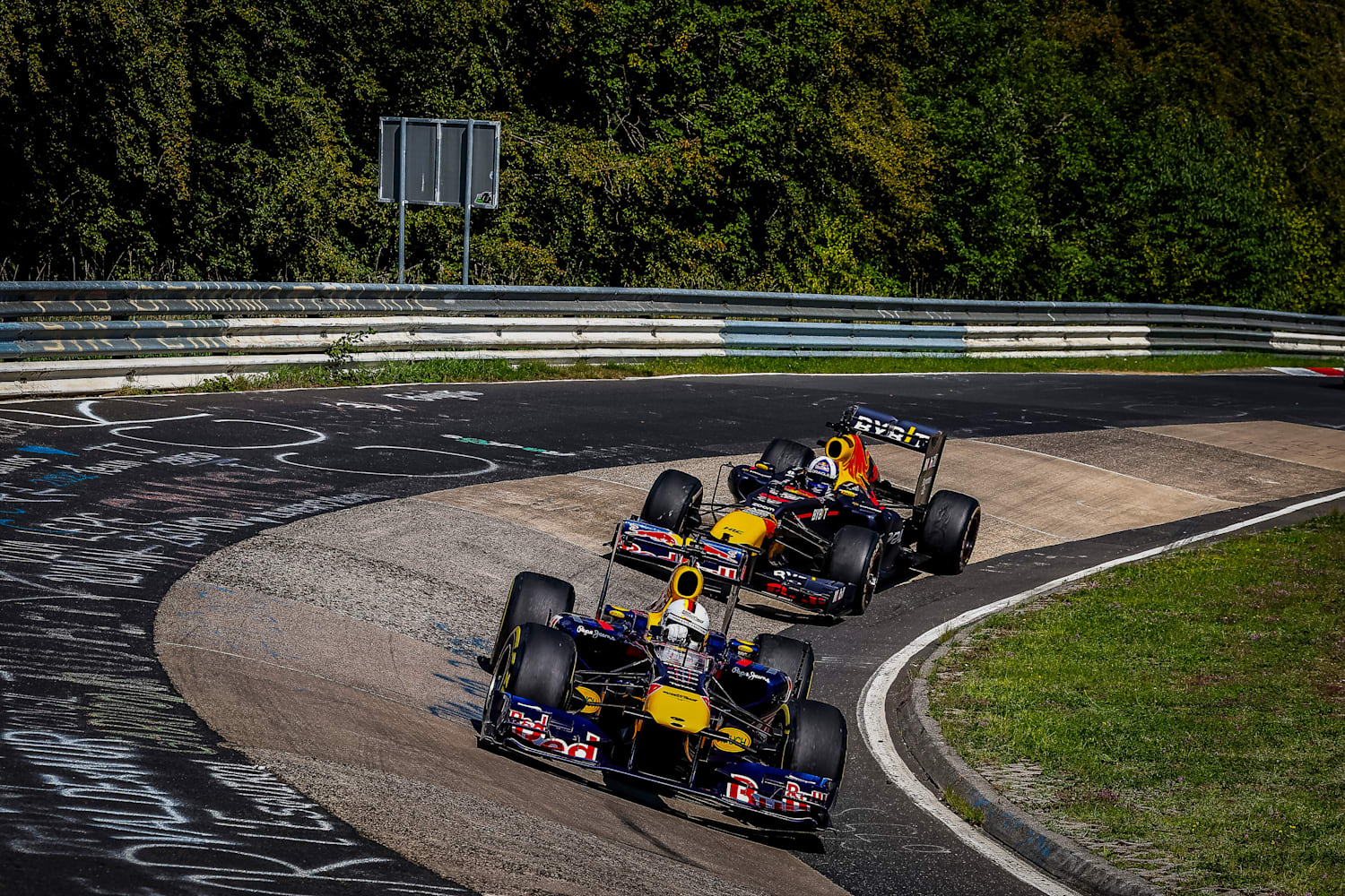 Red Bull driver Sebastian Vettel of Germany celebrates on his car