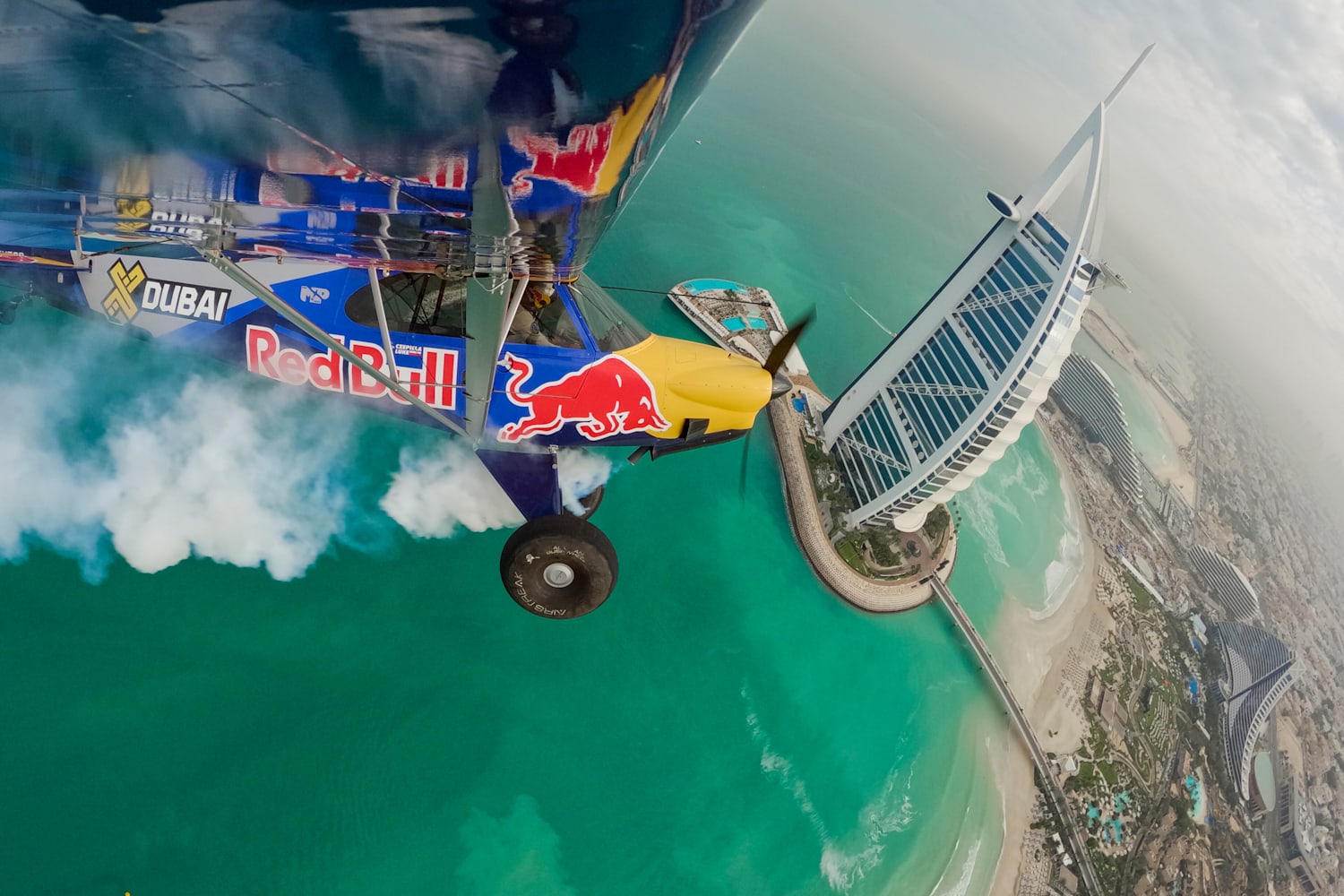 Crazy plane landing on a skyscraper helipad | Red Bull