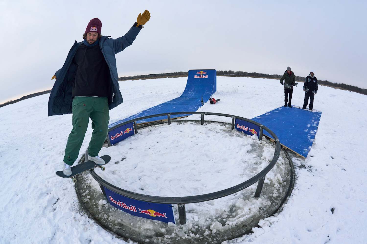 Winter skateboarding with a twist on a frozen lake