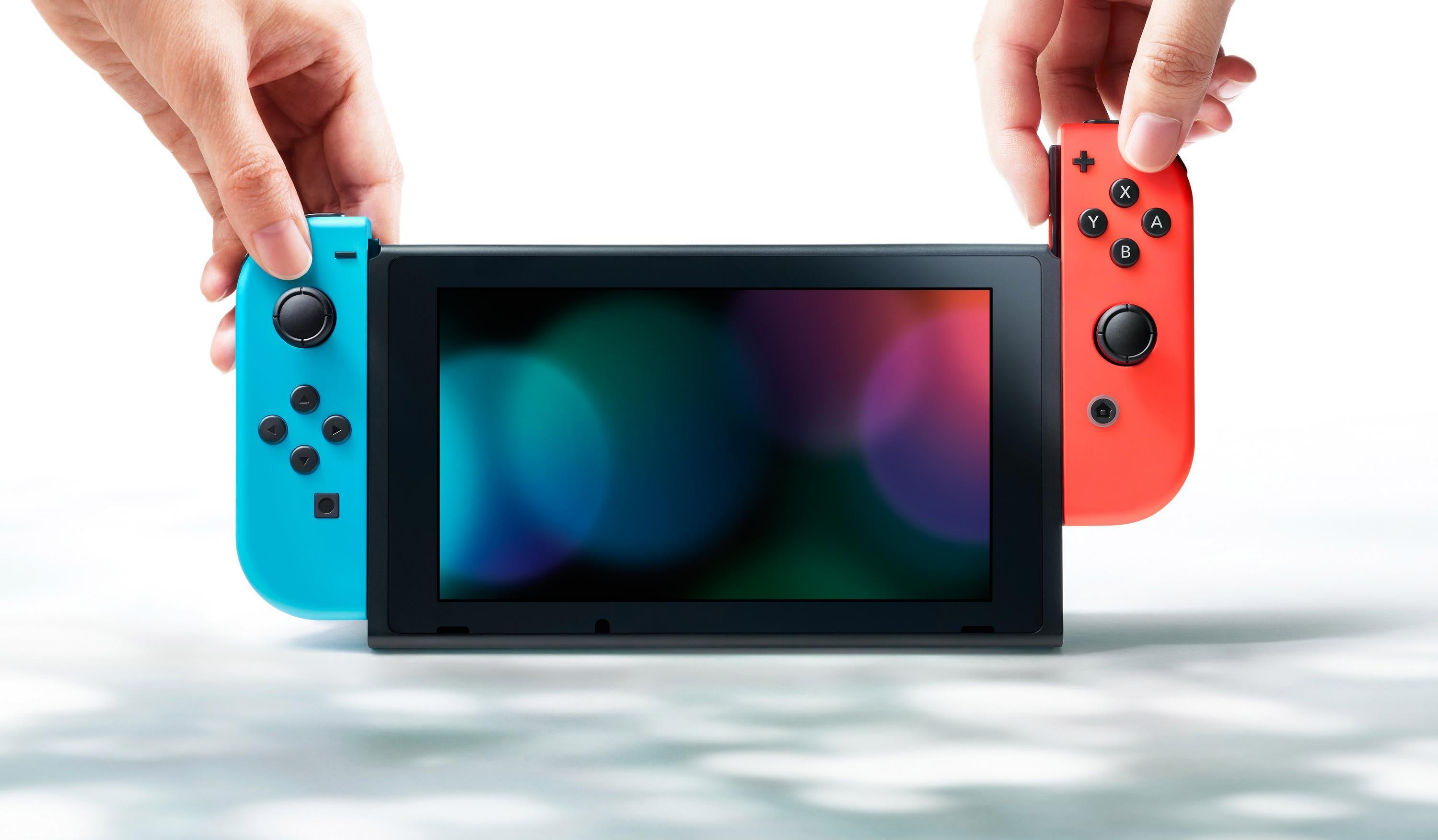 Нинтендо свитч это. Игровая консоль Нинтендо свитч. Игровая приставка Nintendo Switch Neon Red/Neon Blue. Нинтендо свитч Red Blue. Нинтендо свитч 2017.