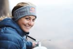 Red Bull athlete Sasha DiGiulian with headband is smiling