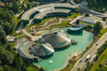 Red Bull headquarter Austria in Fuschl am See near Salzburg with a man-made pond and surrounded by green landscape