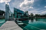 Glass building in the middle of the lake, where Red Bull employees can swim