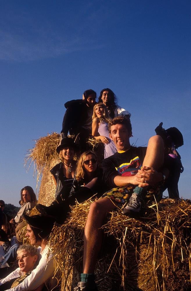 Dave Swindells sitting on hay bales at a rave